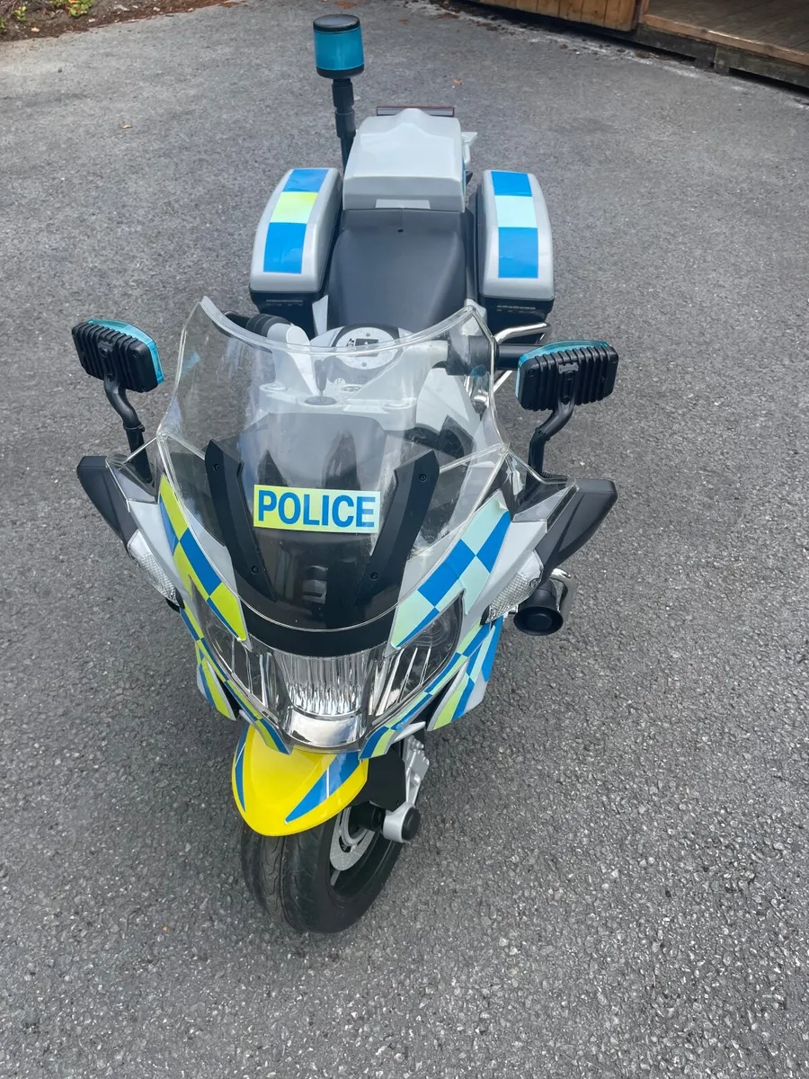 Kids electric ride on police bike - Image 1