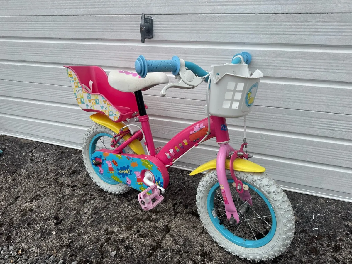 12 inch Peppa Pig bike with basket - Image 1