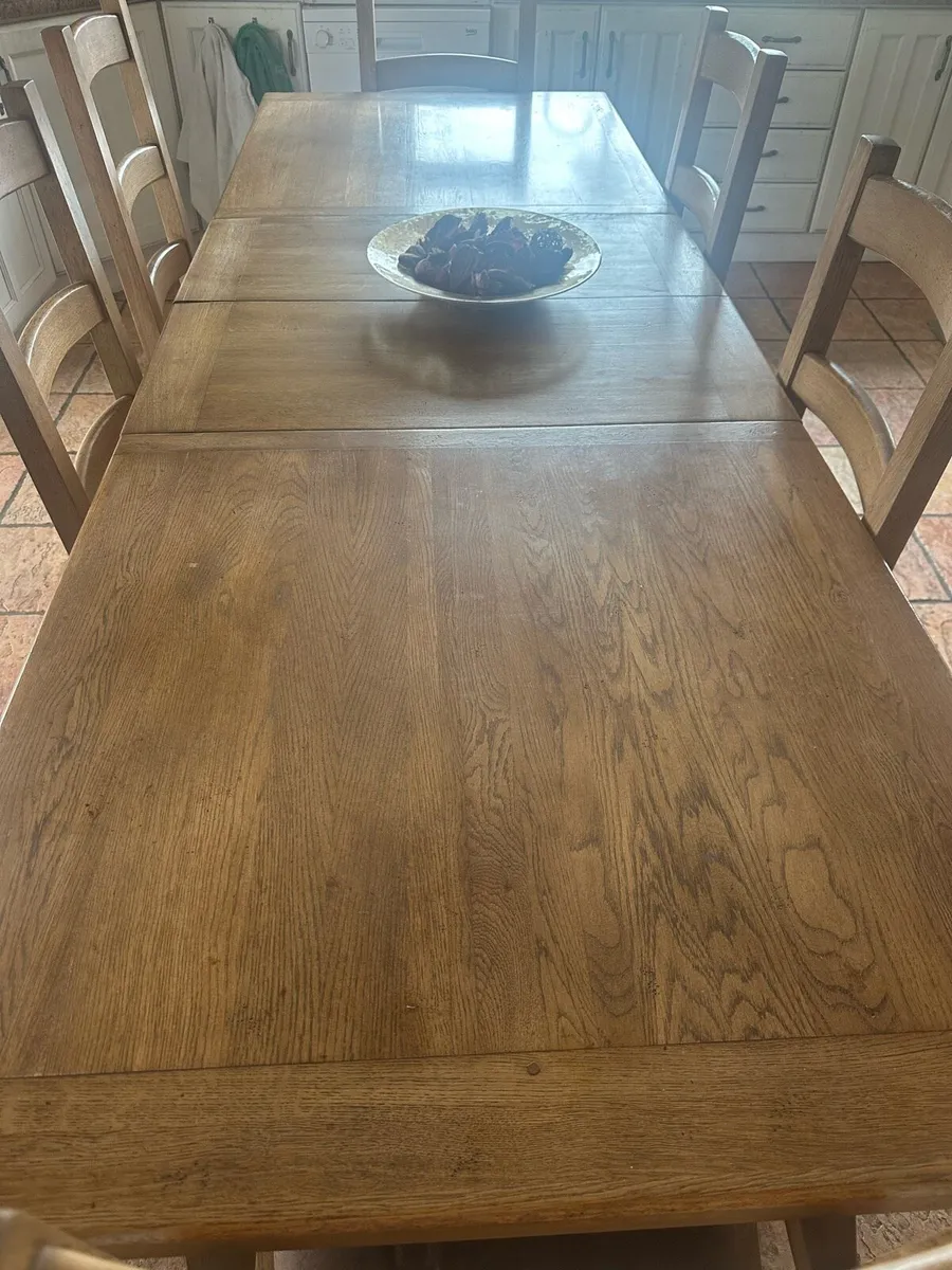 Large 8 SEATER solid oak table and chairs - Image 1
