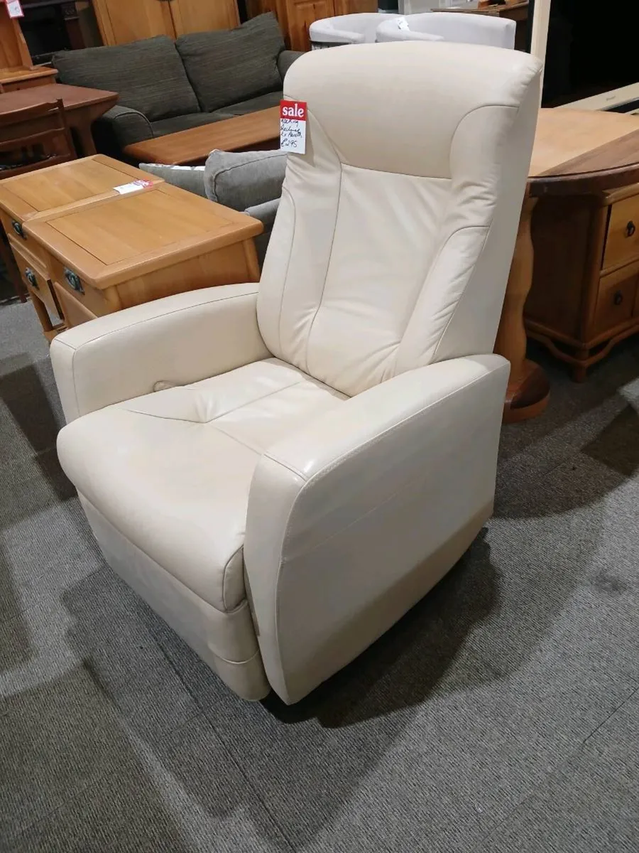 ex Arnotts Cream leather swivel recliner chair - Image 1