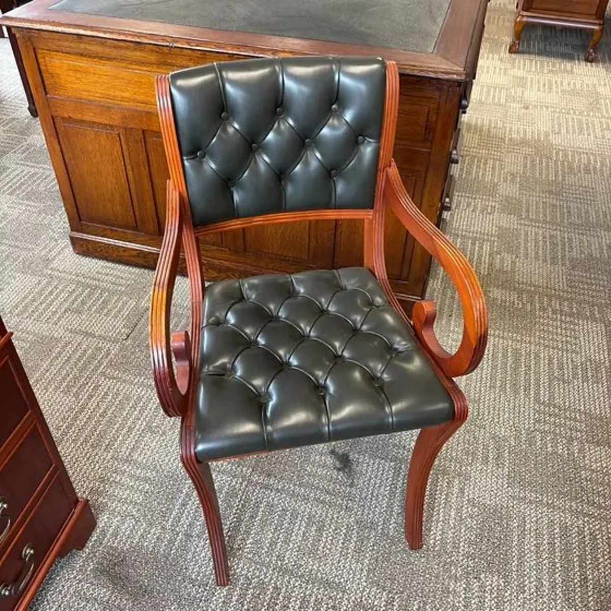 Button backed green leather occasional desk chair