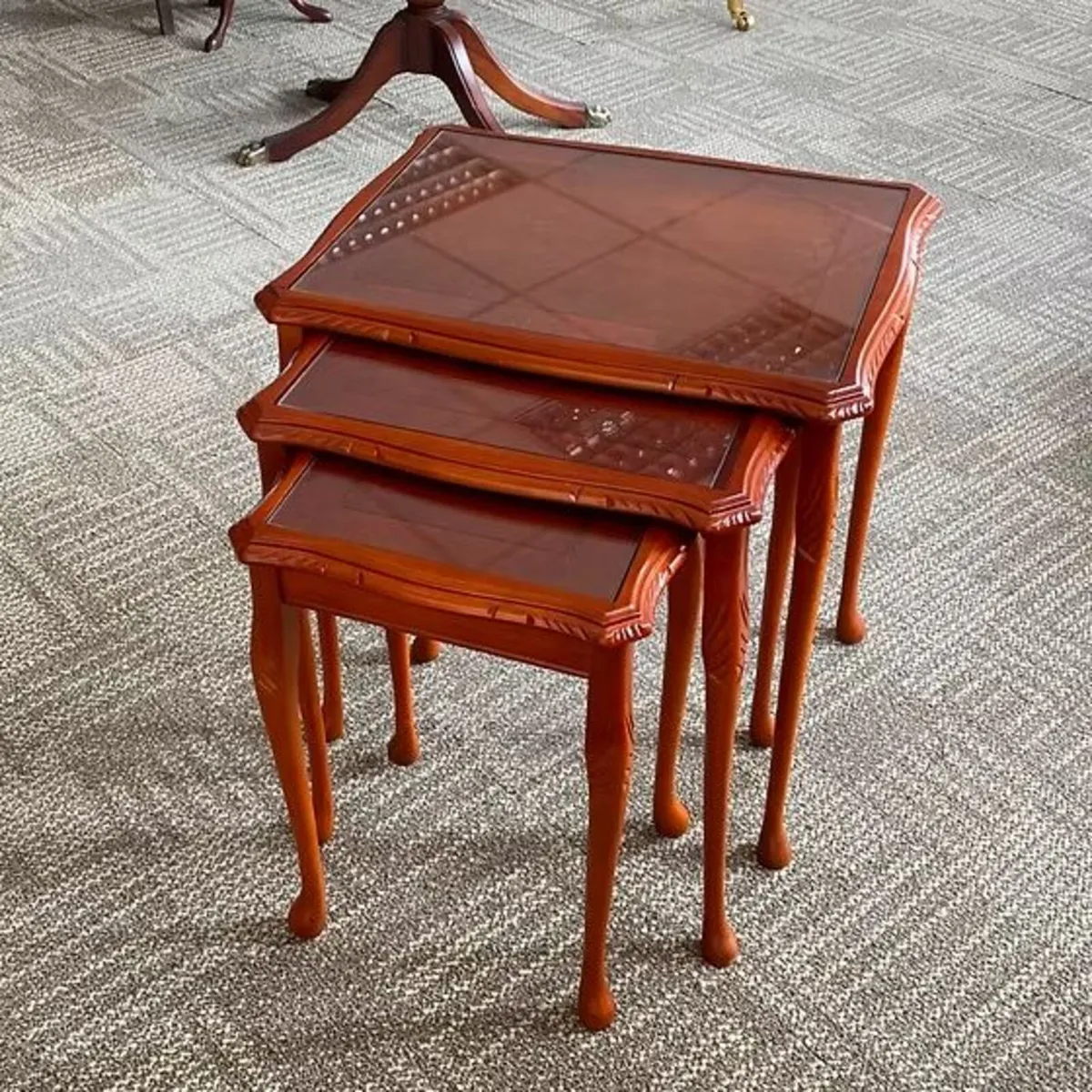 Beautiful set of 3 glass top nest of tables