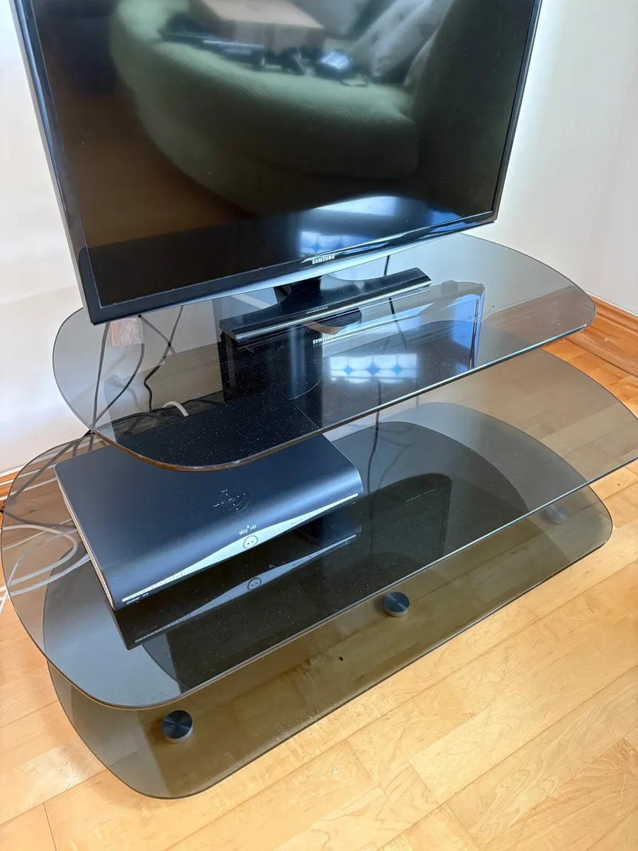 Smokey black glass tv stand - Image 1