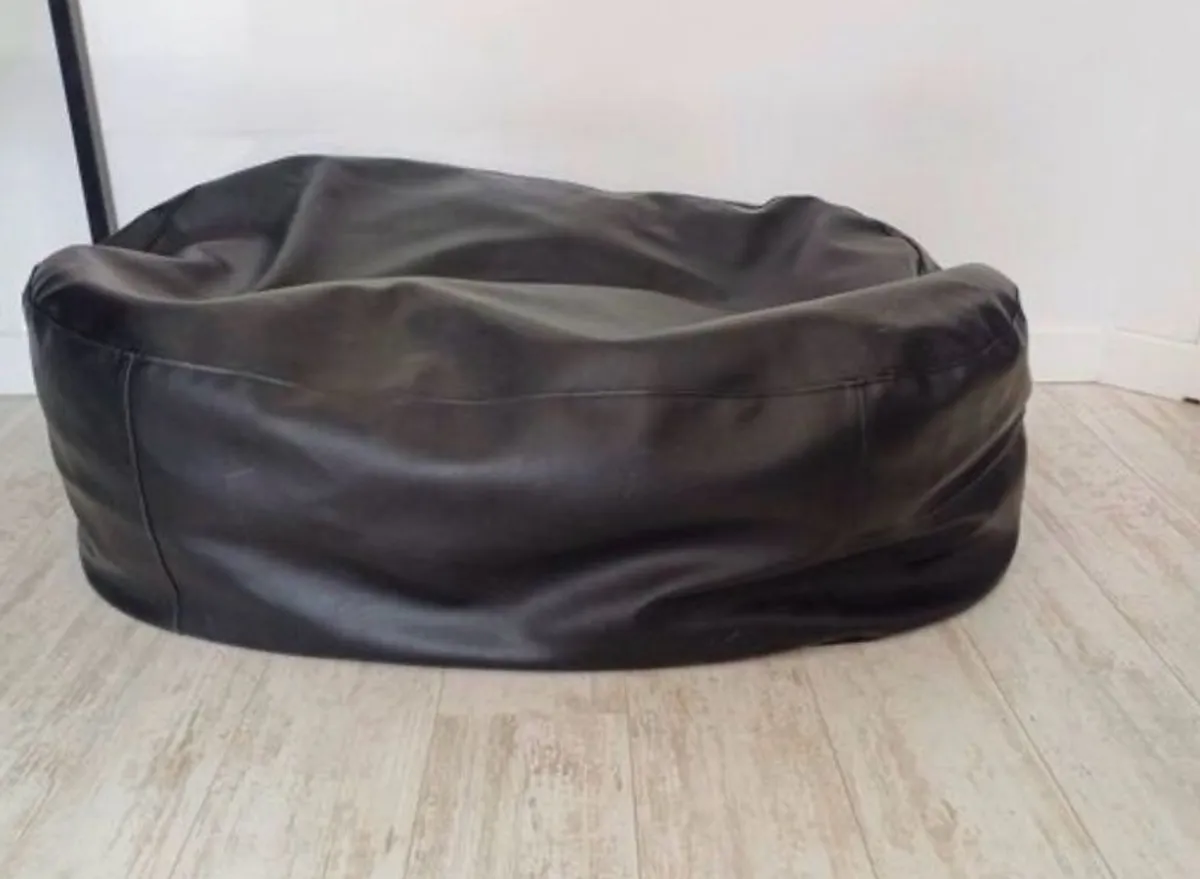 Two black leather-feel bean bags - Image 1