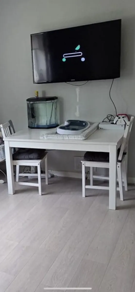 Expandable table and three chairs