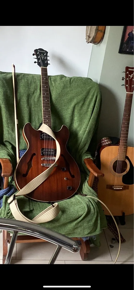 Ibanez As53 Guitar and Yamaha 12 string guitar. - Image 1