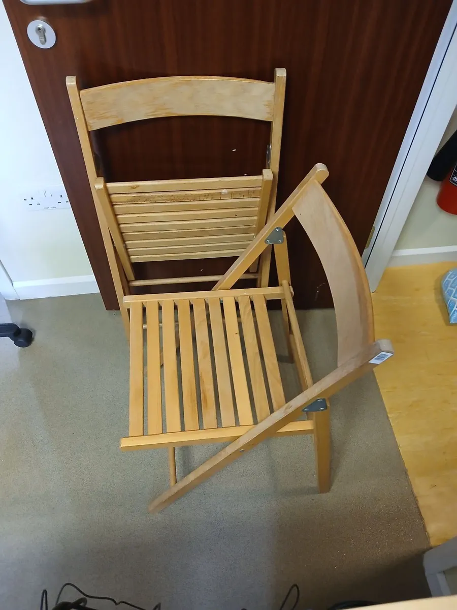 Wooden fold away two designer chairs