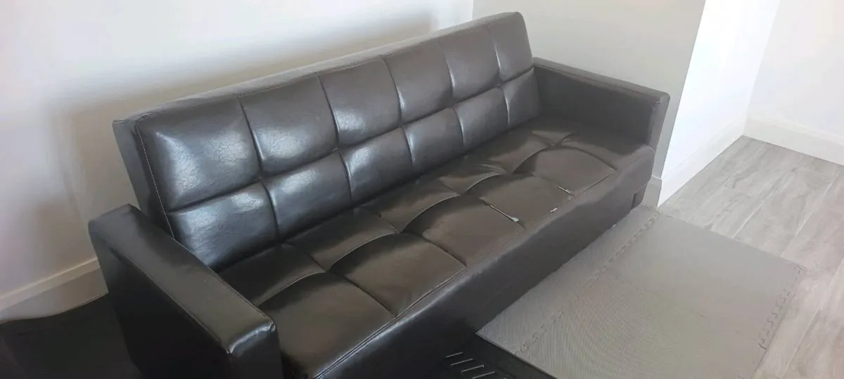 Foldable leather sofa bed - Image 1