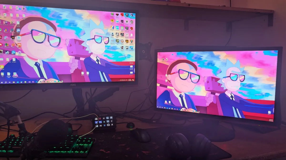 Two 24' Aoc 144hz gaming monitors + dual stand - Image 1