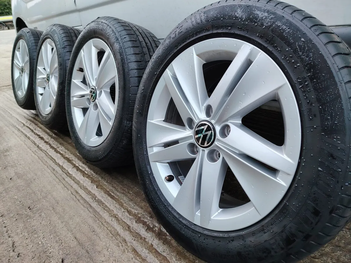 VW alloy wheels with tyres - Image 1