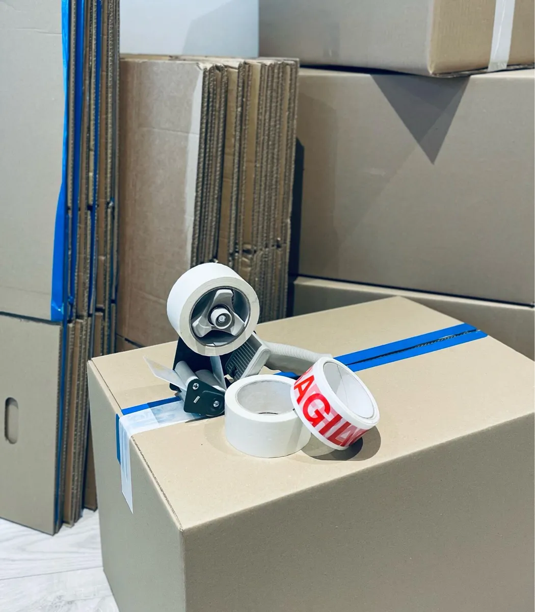 Boxes and tape - Image 1