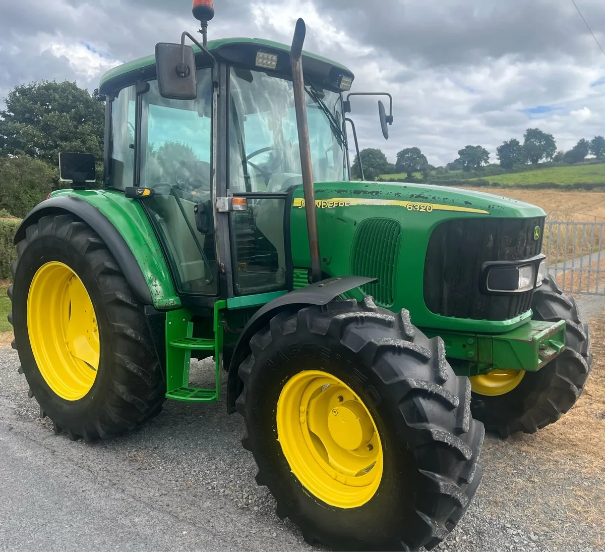 John Deere 6320 - Image 1