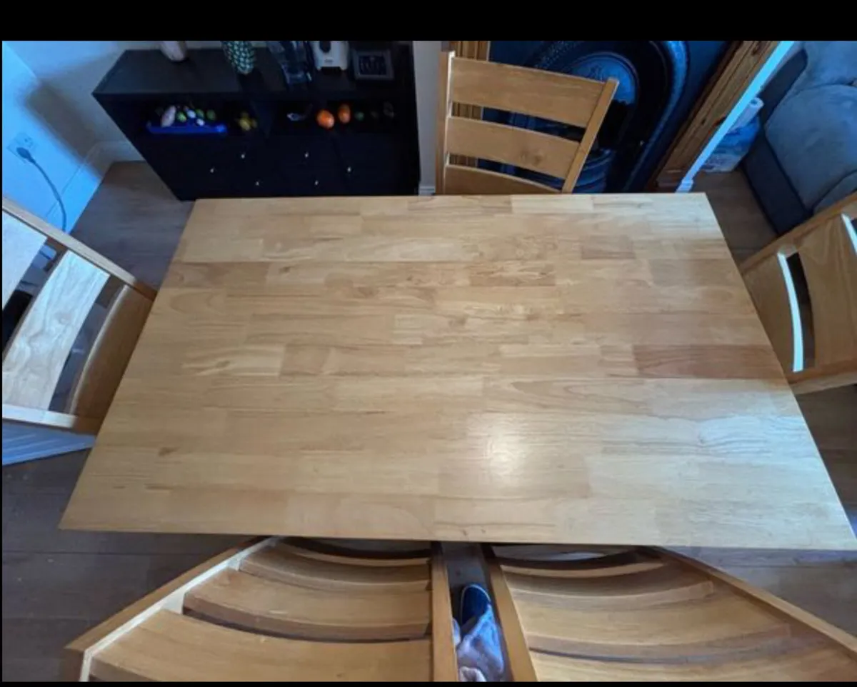 Dinning table and 6 chairs (5 ft) - Image 1