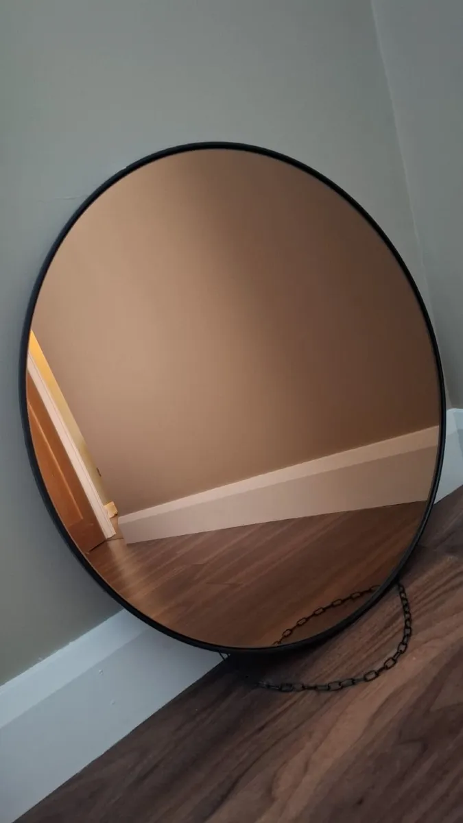 Large tinted glass mirror