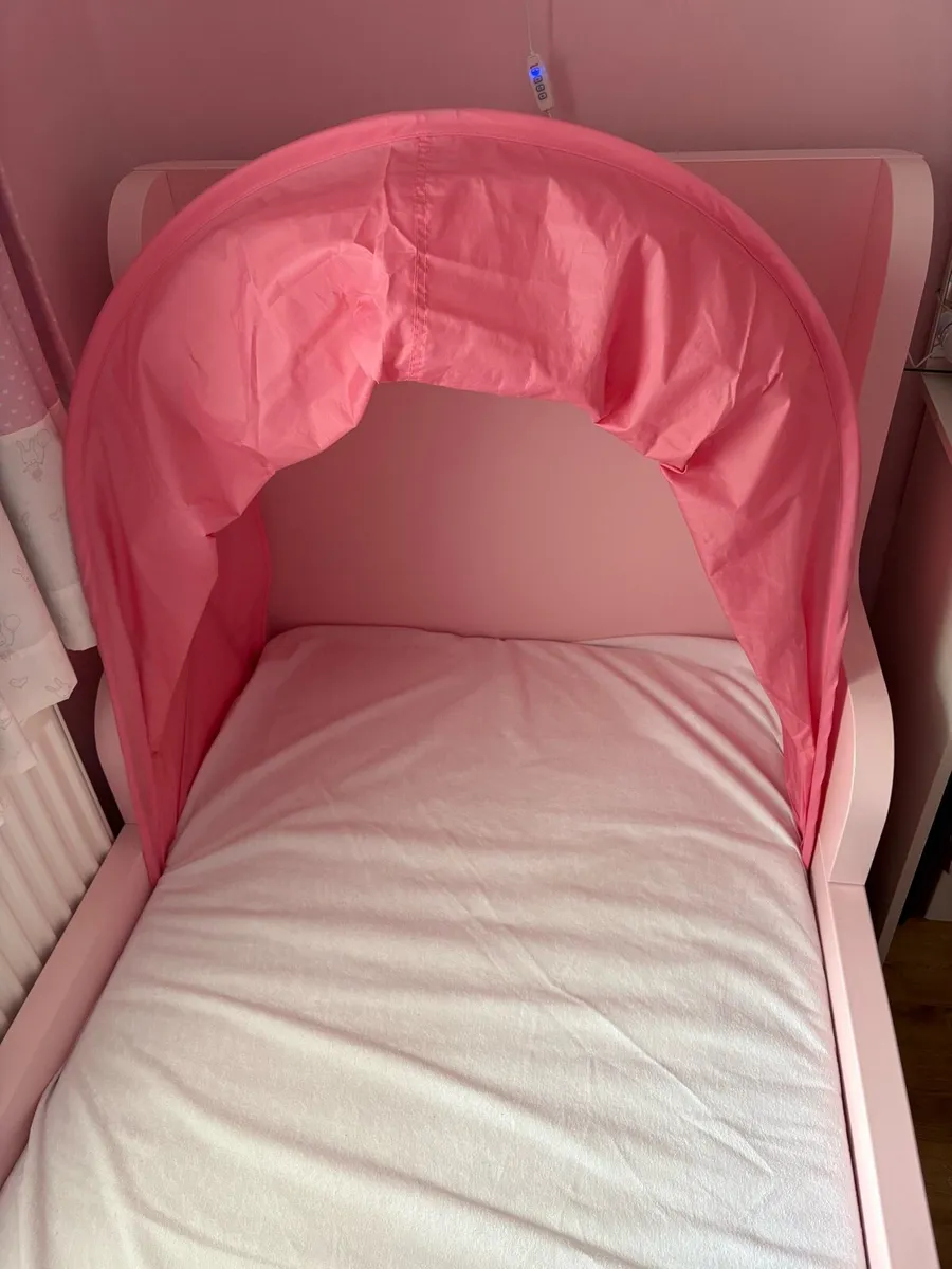 Pink Ikea children’s extendable bed (BUSUNGE) - Image 4