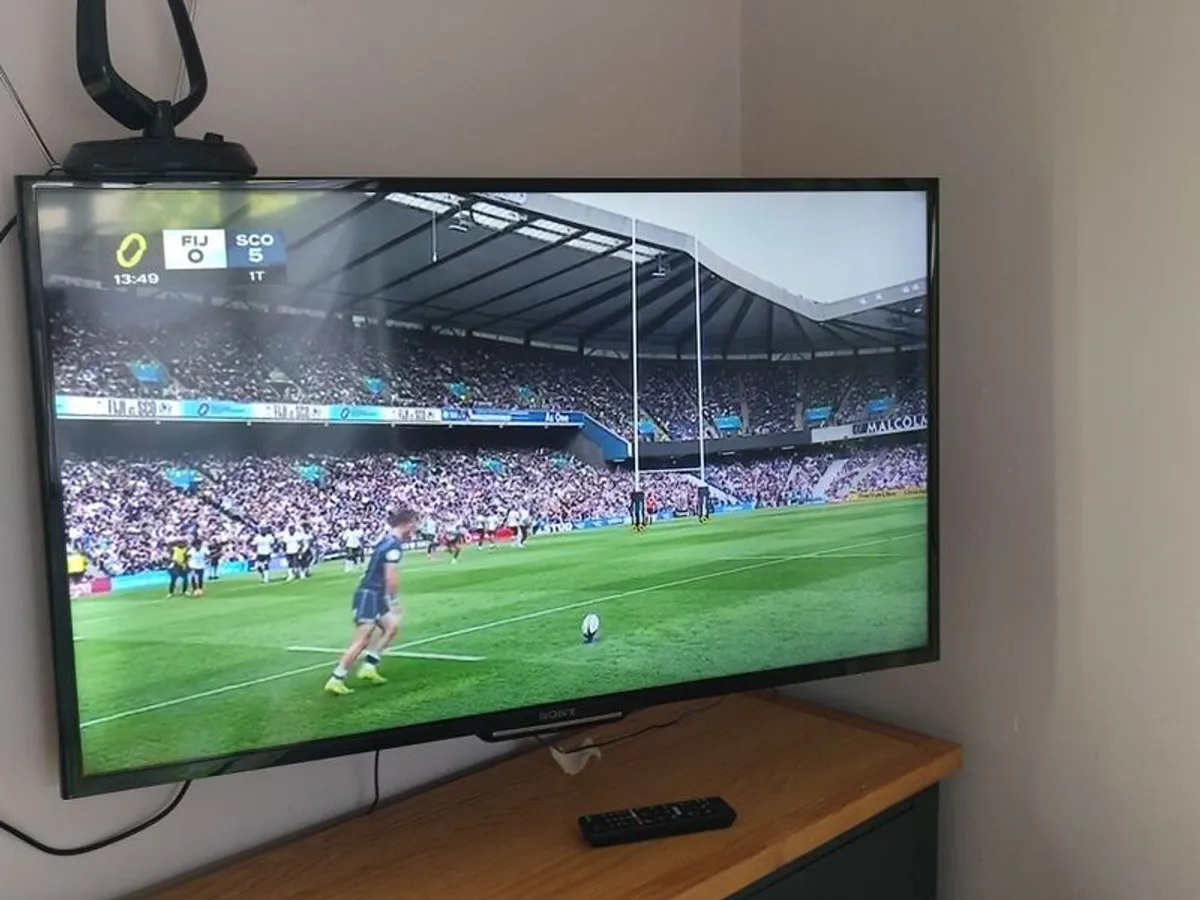Not a smart TV 42" with a holder - Image 2