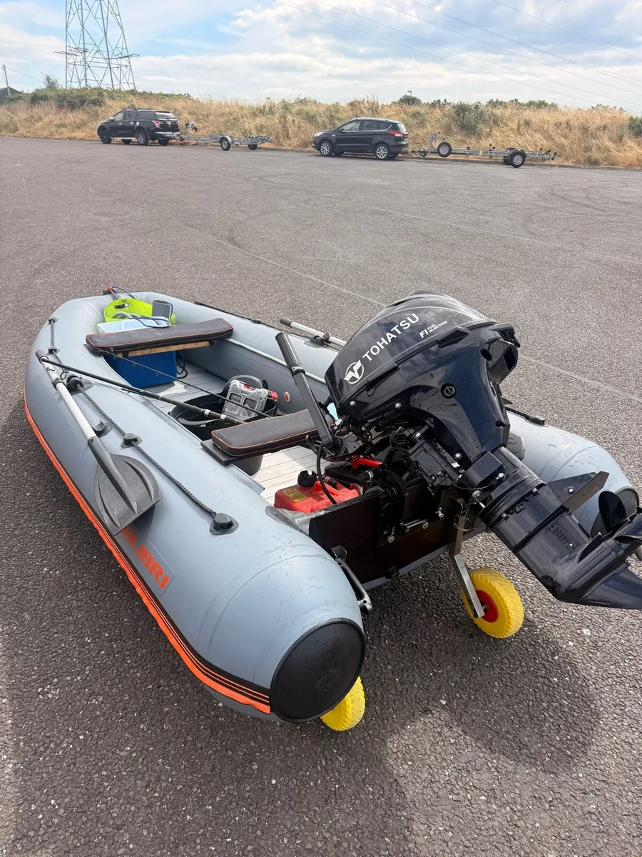 Kolibri inflatable with Tohatsu 20hp outboard - Image 1