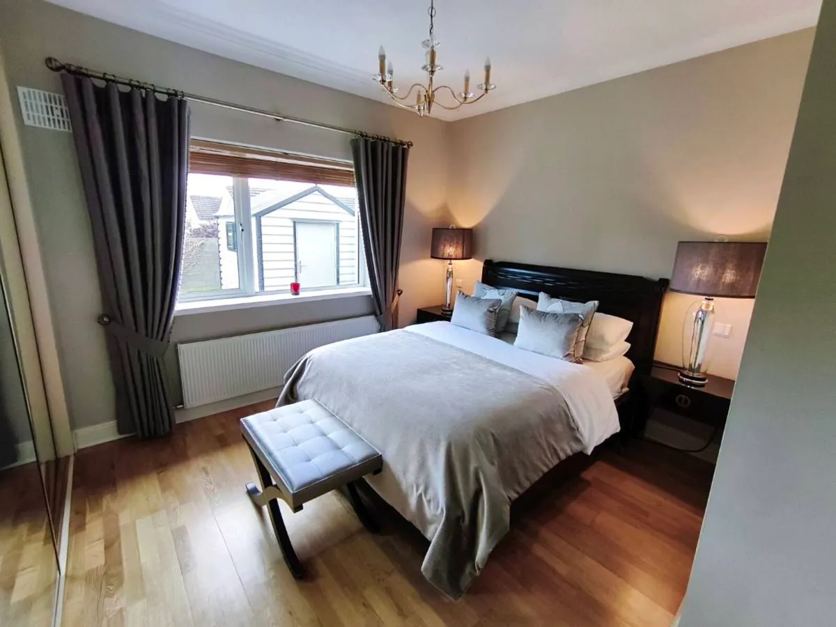 Dark wooden King Size Bed