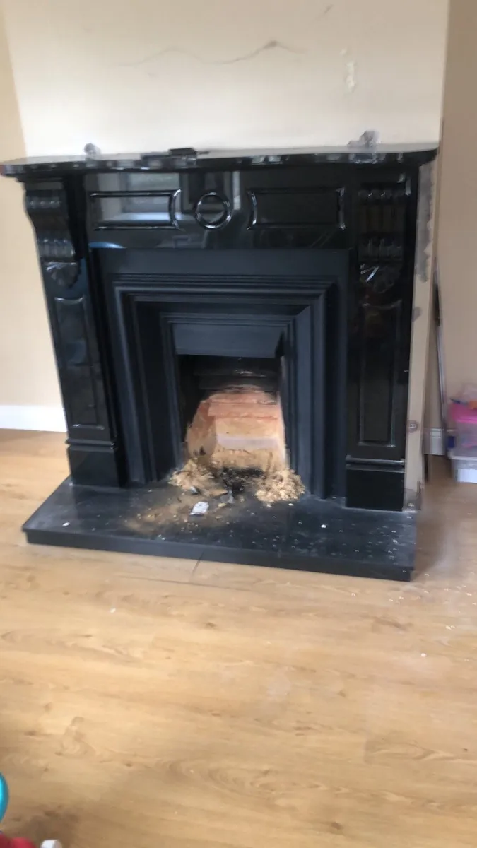 Black granite fireplace