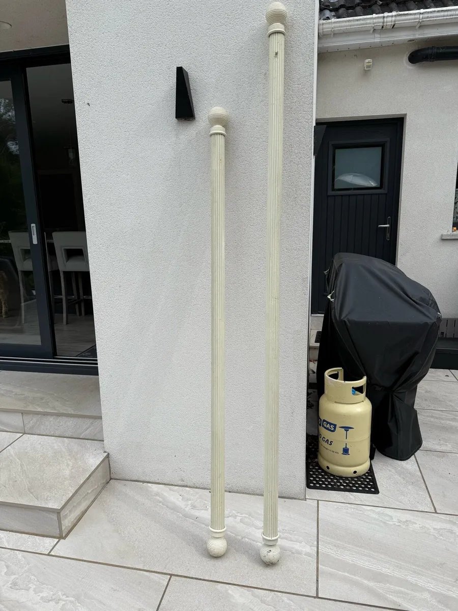 Ornate curtain poles