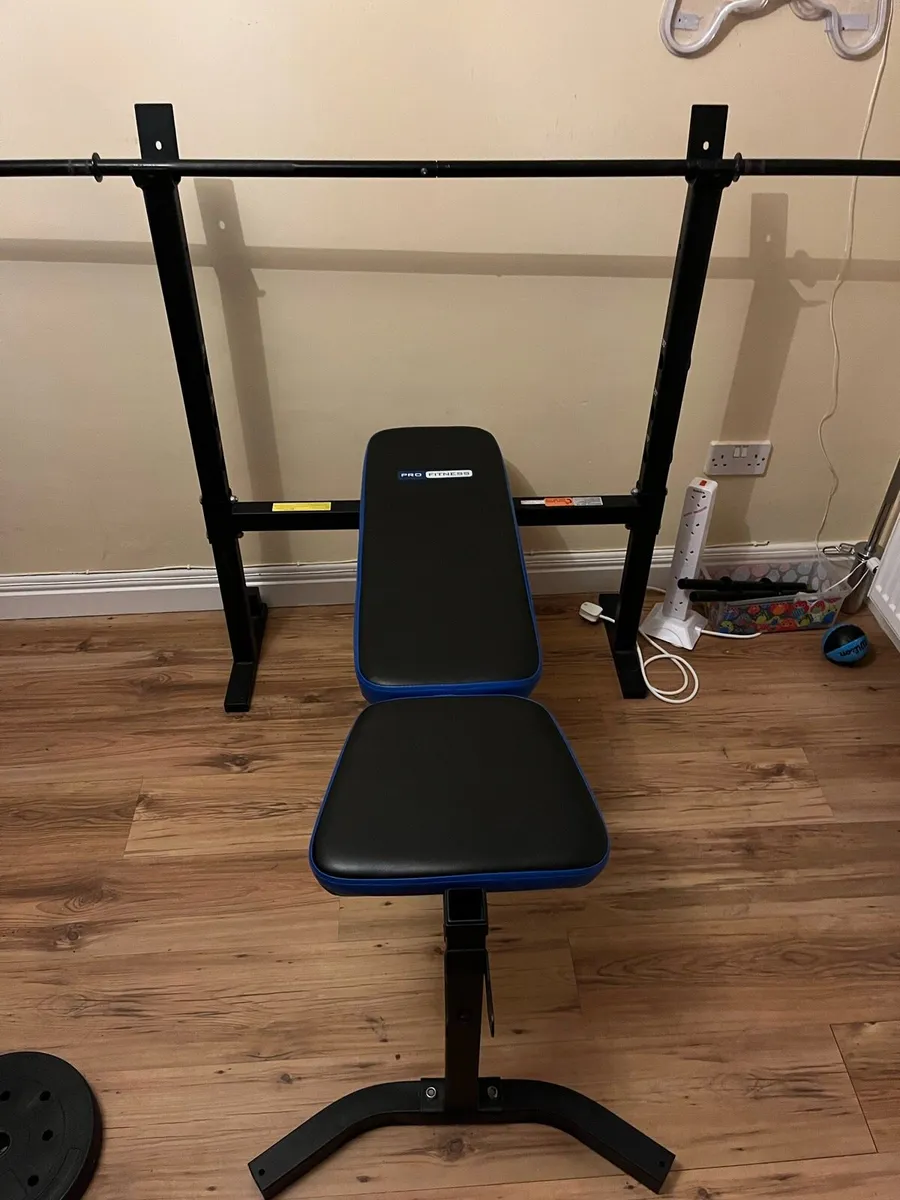 Weight bench incl 20kg weights and Olympic bar - Image 1