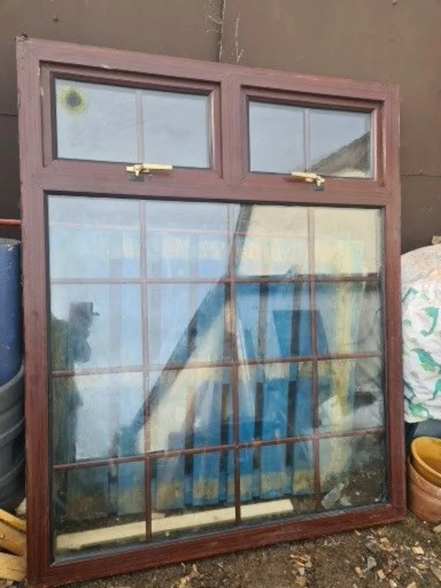 Wood colored PVC Georgian style window with