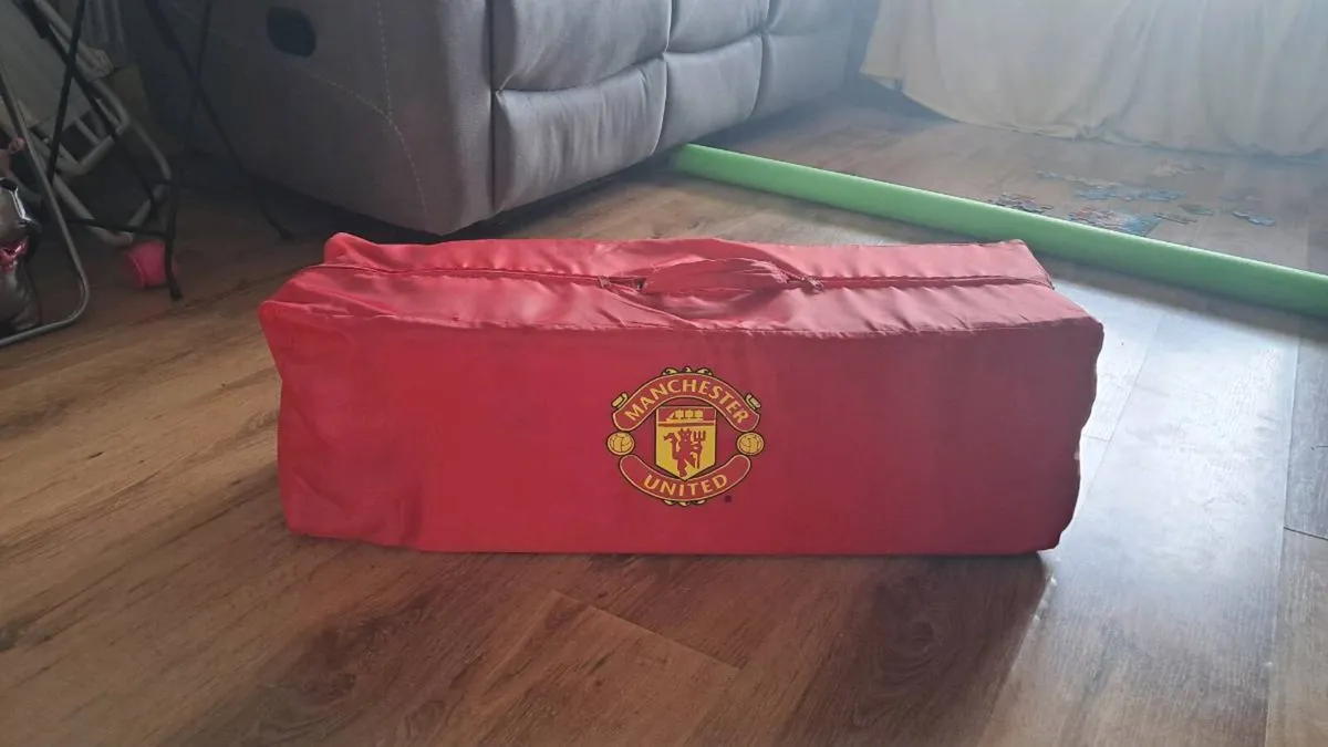 Manchester United travel cot - Image 1