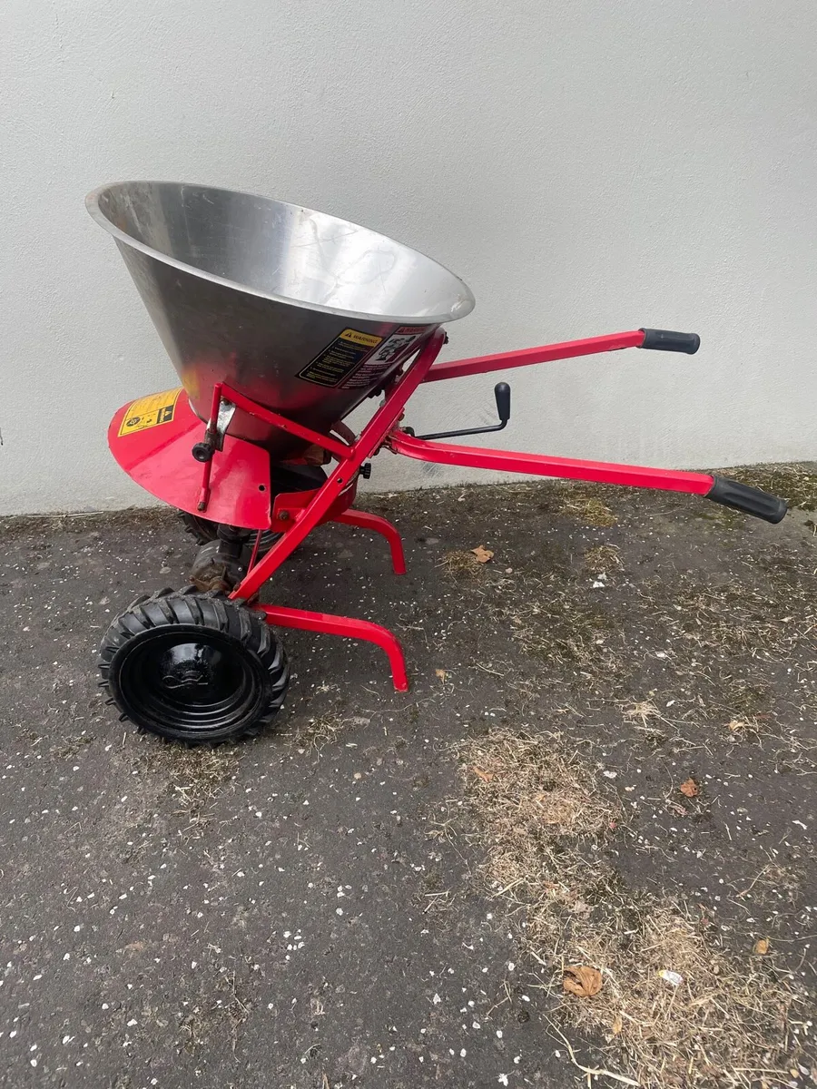 Peacock Salt Dolomite Spinning Salt Spreader - Image 1