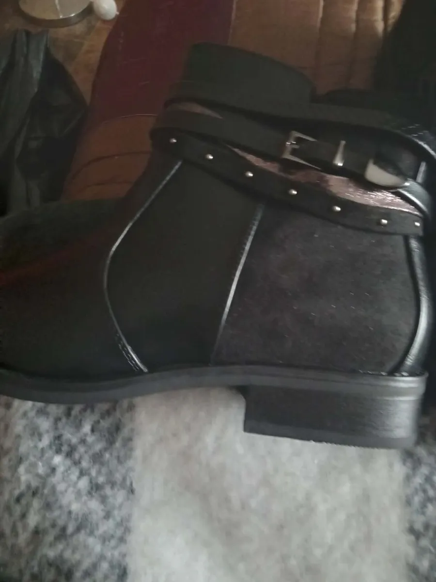 Clothes and boots for sale - Image 1