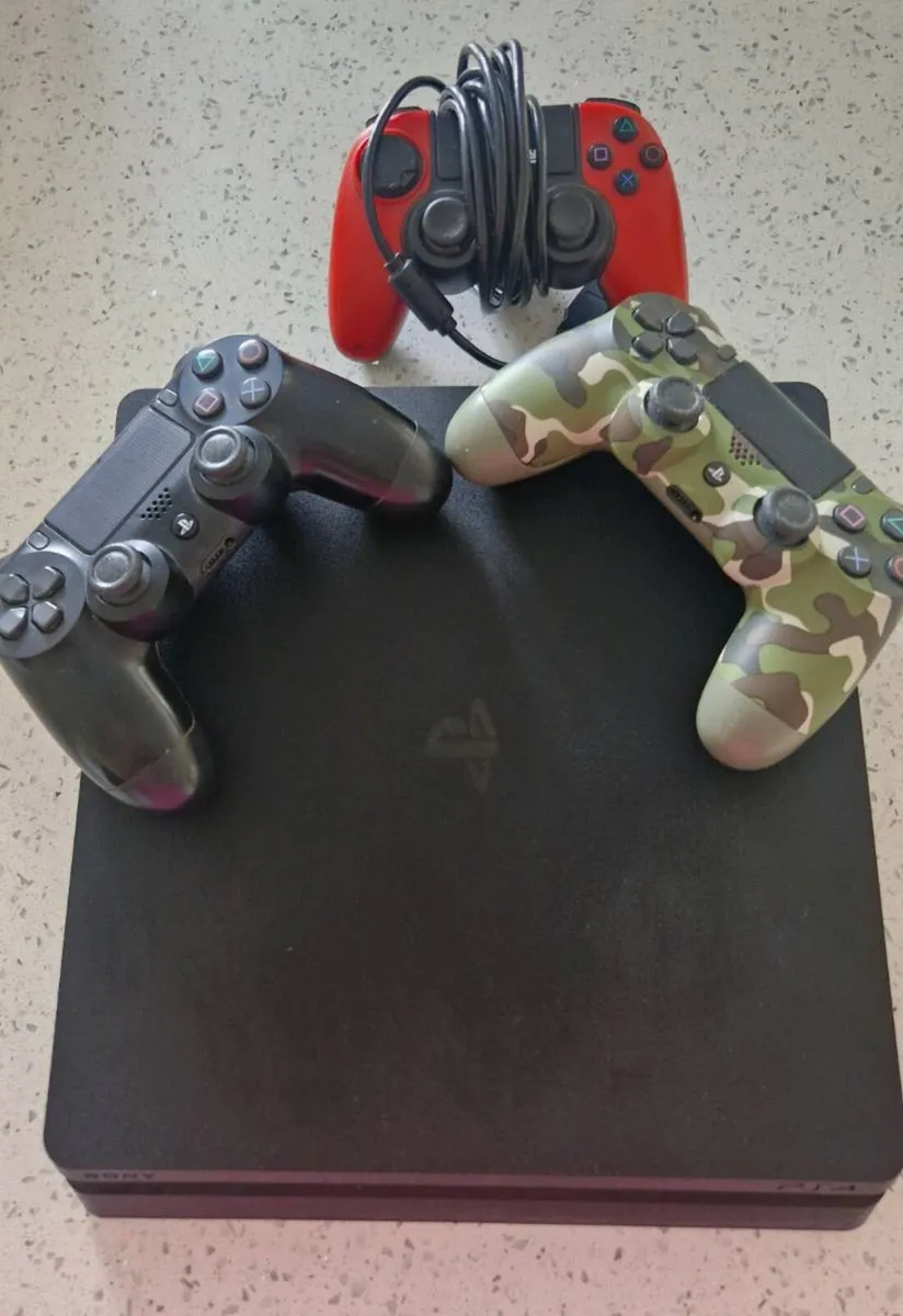 PS4 and Controllers - Image 1