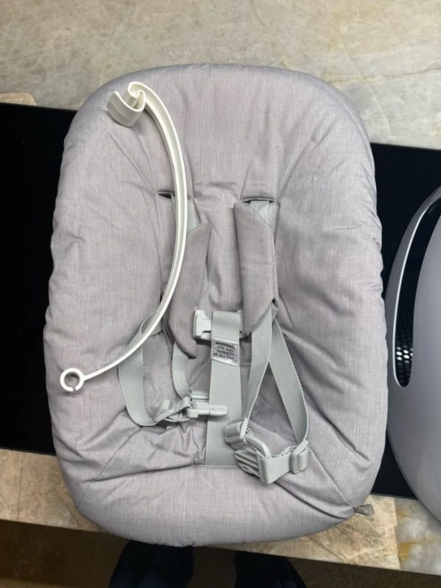 stokke newborn seat with toy hanger