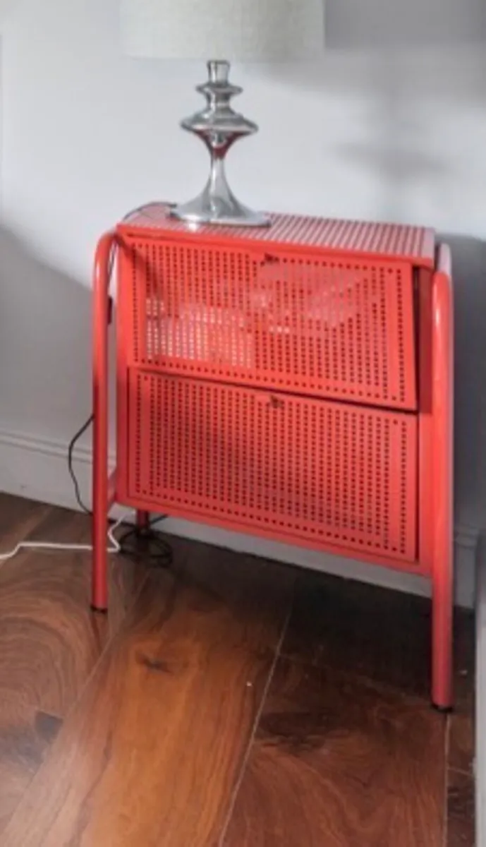 Red metal beside drawers