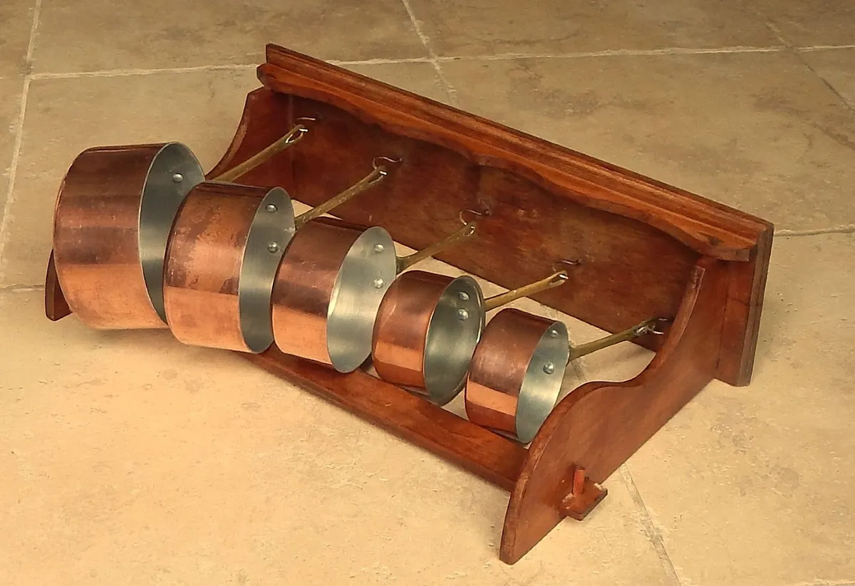 5 Copper Saucepans on Wall Mounted Wood Shelf - Image 1