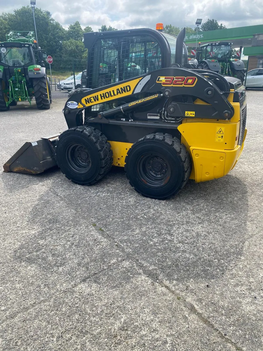 2023 New Holland L320 Skid Steer - Image 1