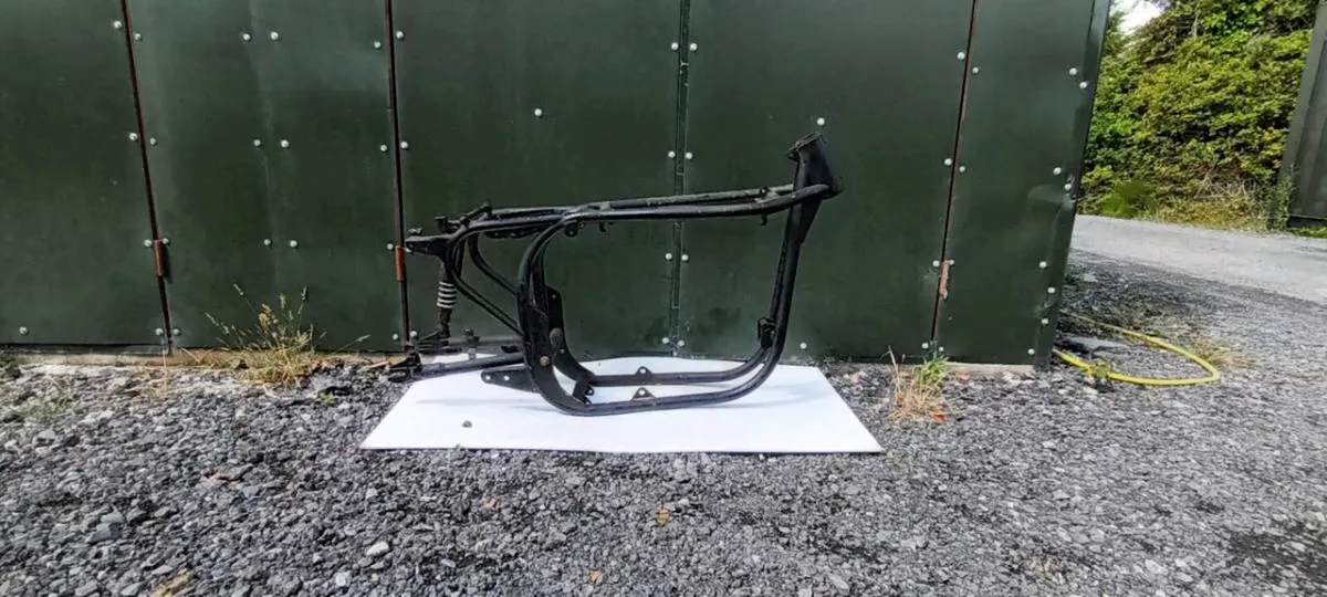 Norton frame and book + Triumph and BSA reg books - Image 1