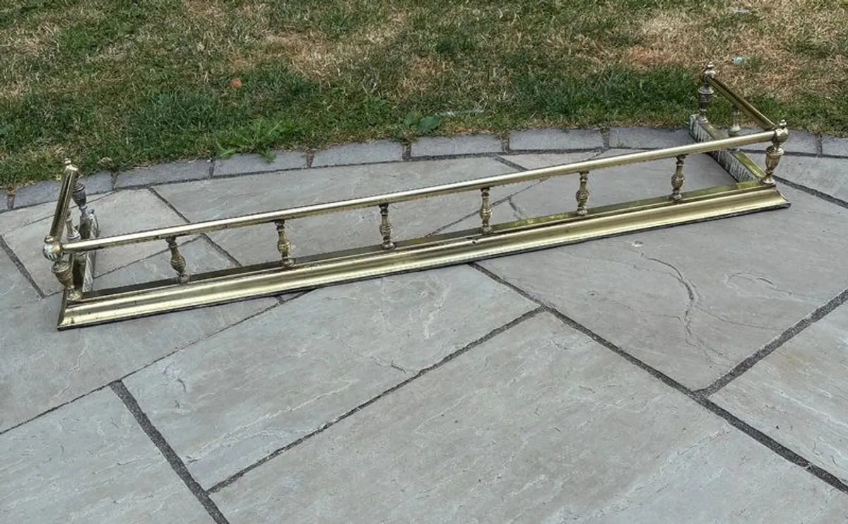 Antique brass fire fender