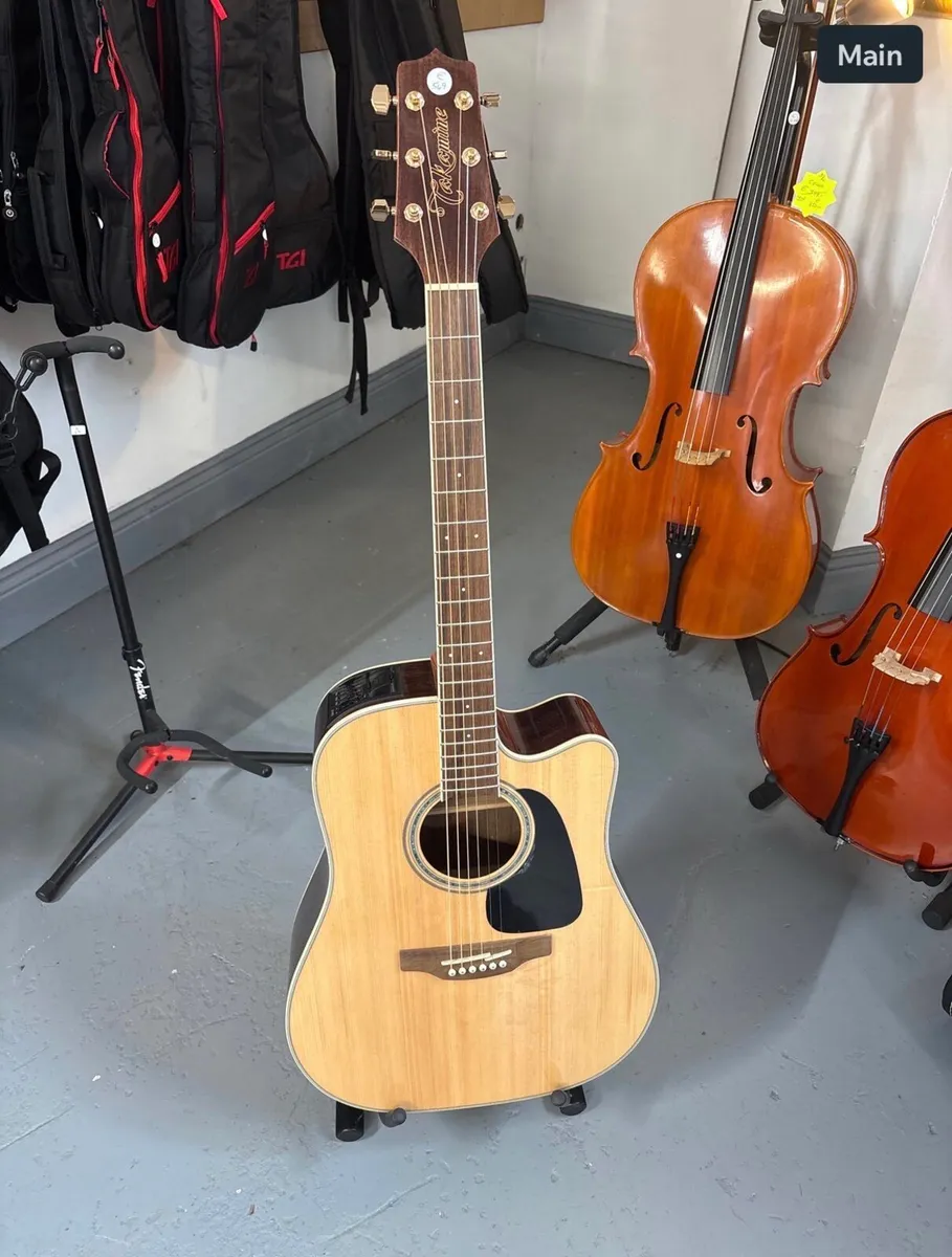 Takamine semi acoustic guitar with tuner