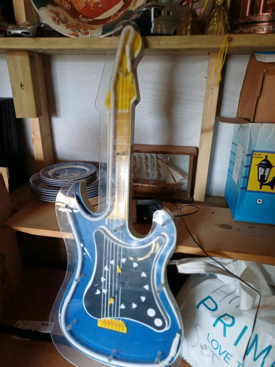Vintage Blue Neon Light Clock Guitar - Image 1