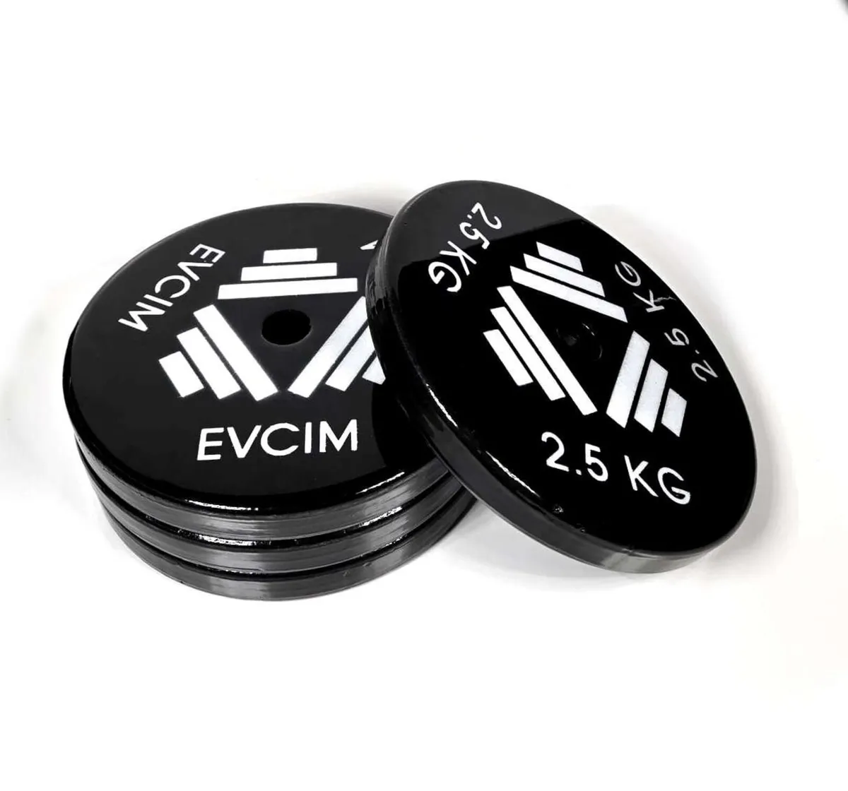 Weight plates and dumbells - Image 1