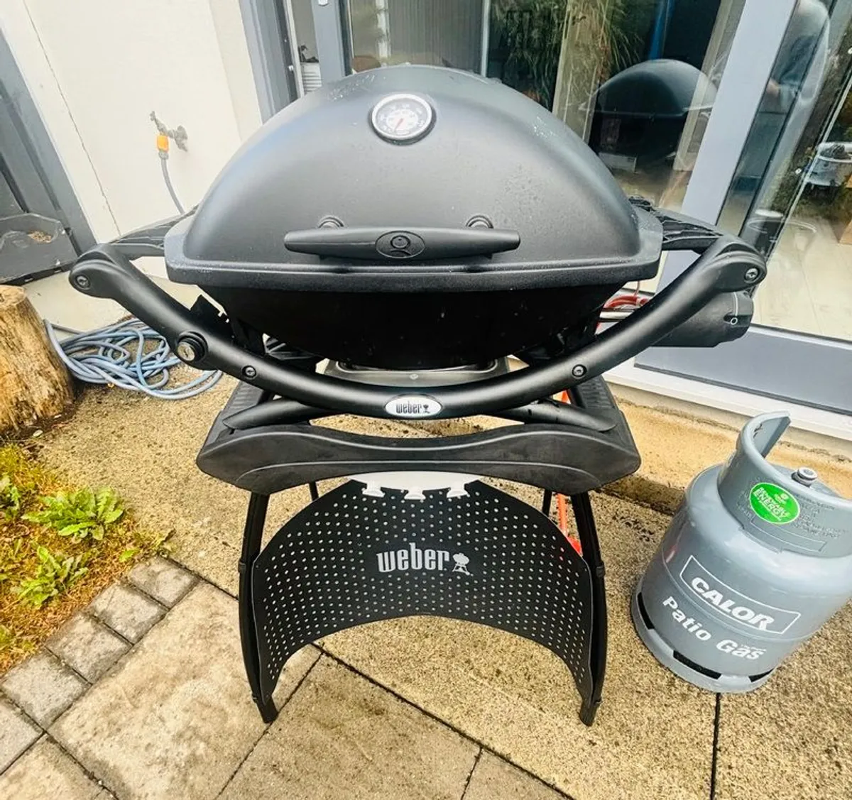 Weber Gas BBQ + Stand For Sale - Image 1