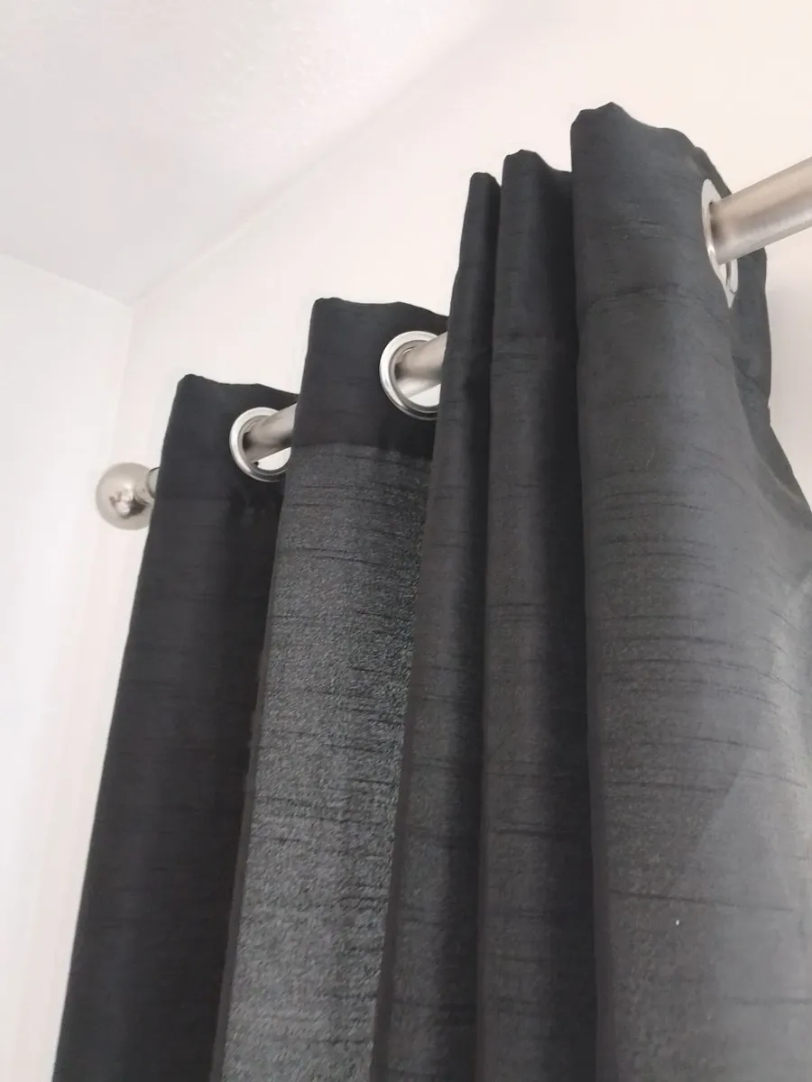 PAIR OF JET BLACK LINED EYELET CURTAINS. 66 x 72. - Image 1