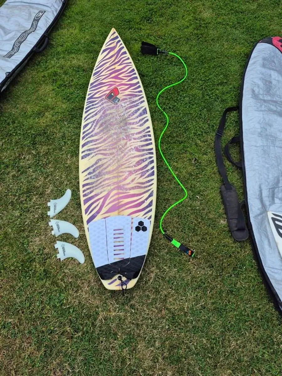 3 surfboards with fins, leash and bags - Image 1