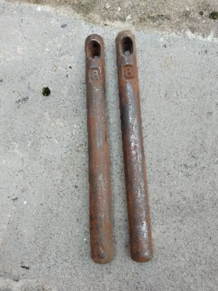 Vintage cast iron window weights