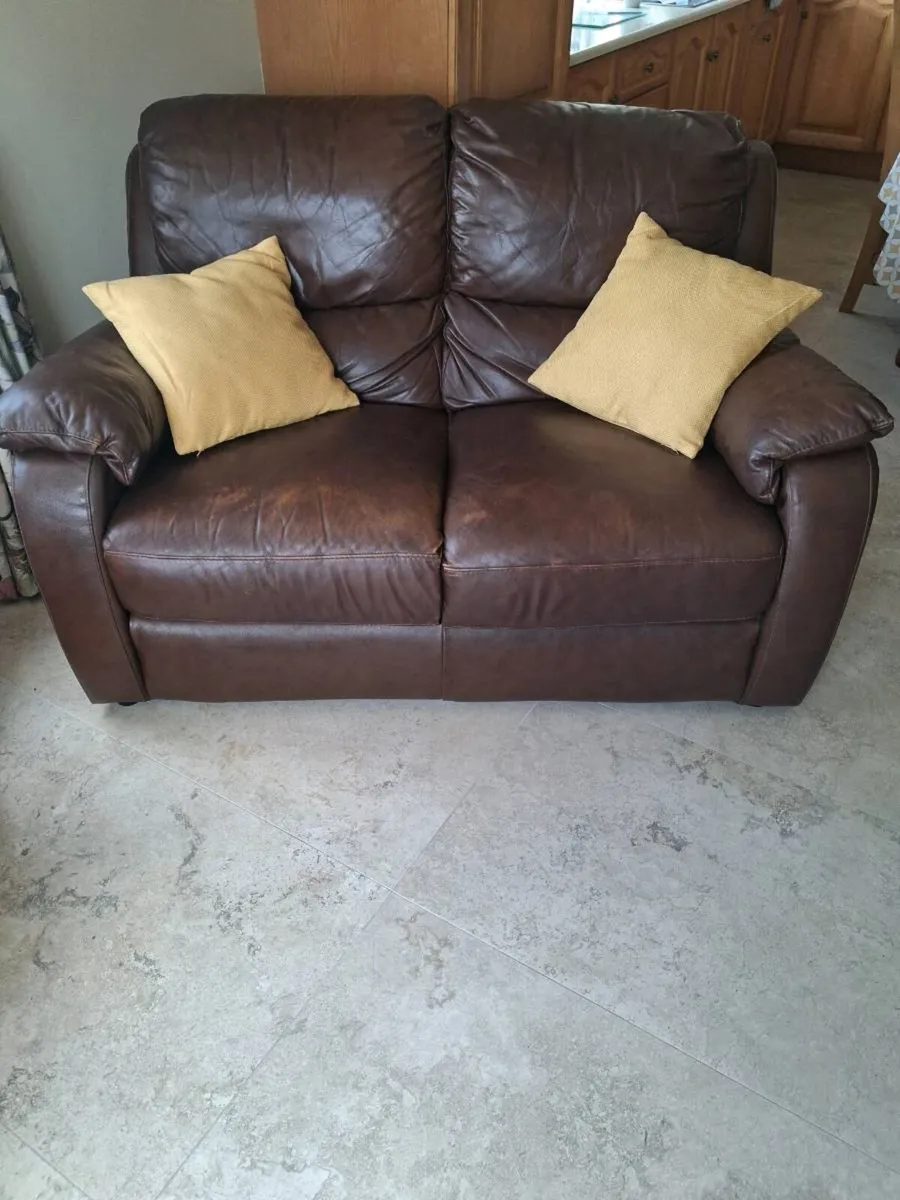 2 seater brown leather couch