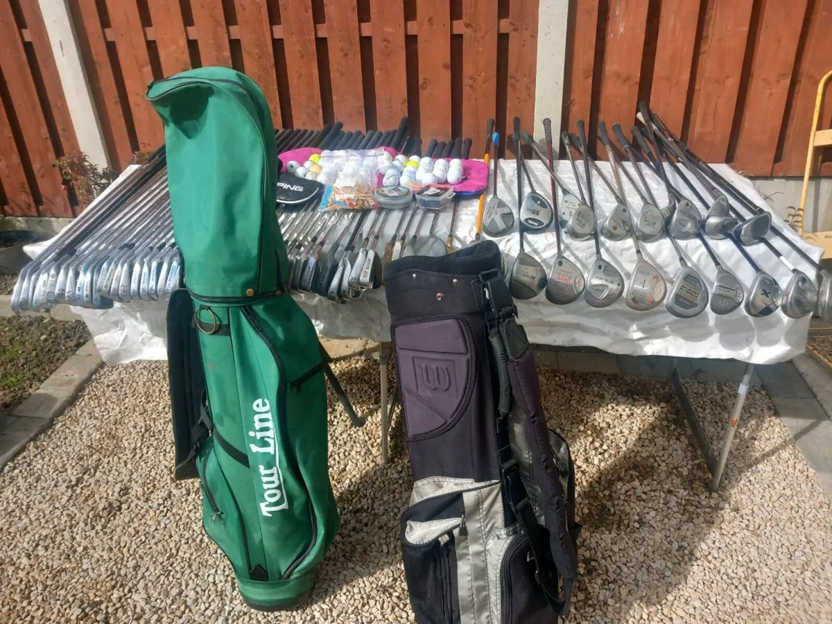 A selection of golf clubs and bags. - Image 1