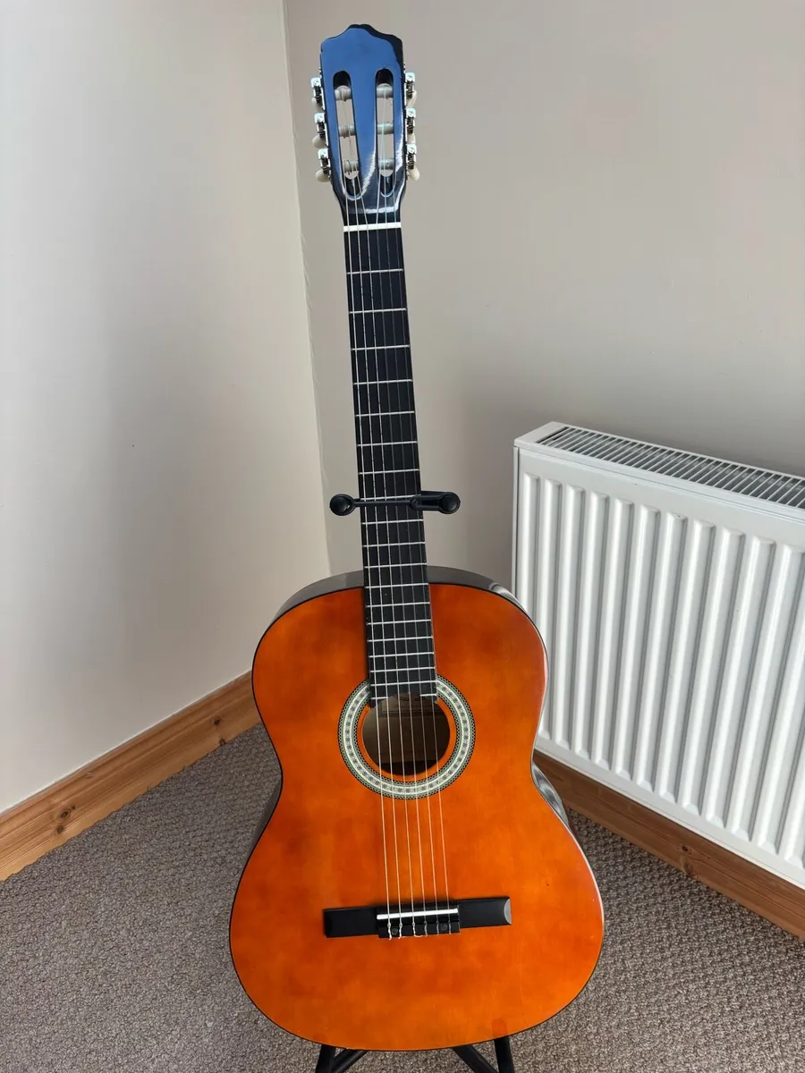 Acoustic guitar with bag,stand and picks - Image 2
