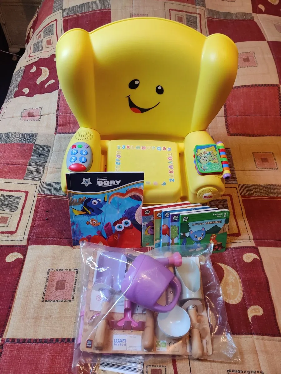 Fisher-Price Chair + new gardening tools + book