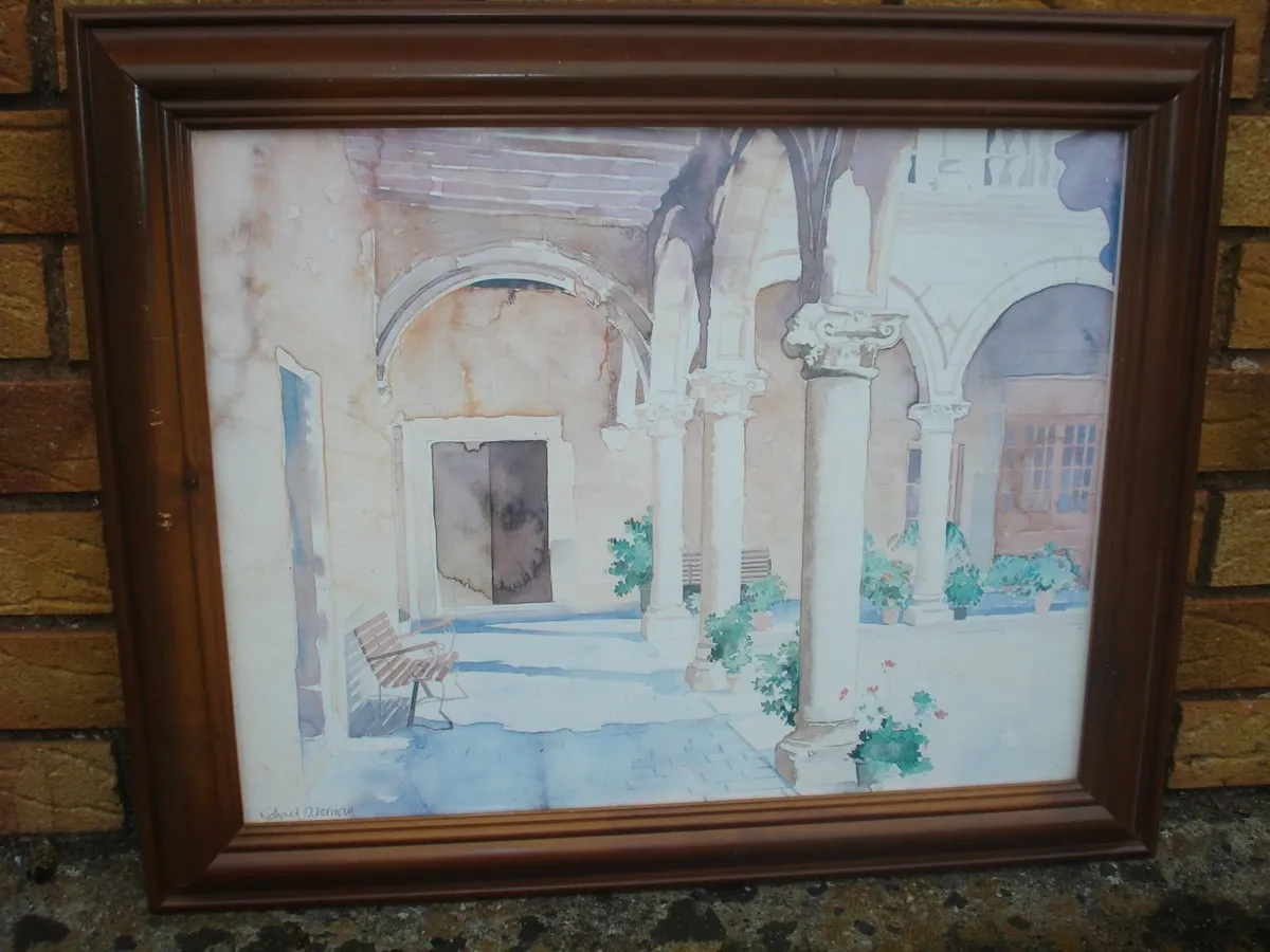 PRINT OF OLD BUILDING COLUMNS IN COURTYARD.