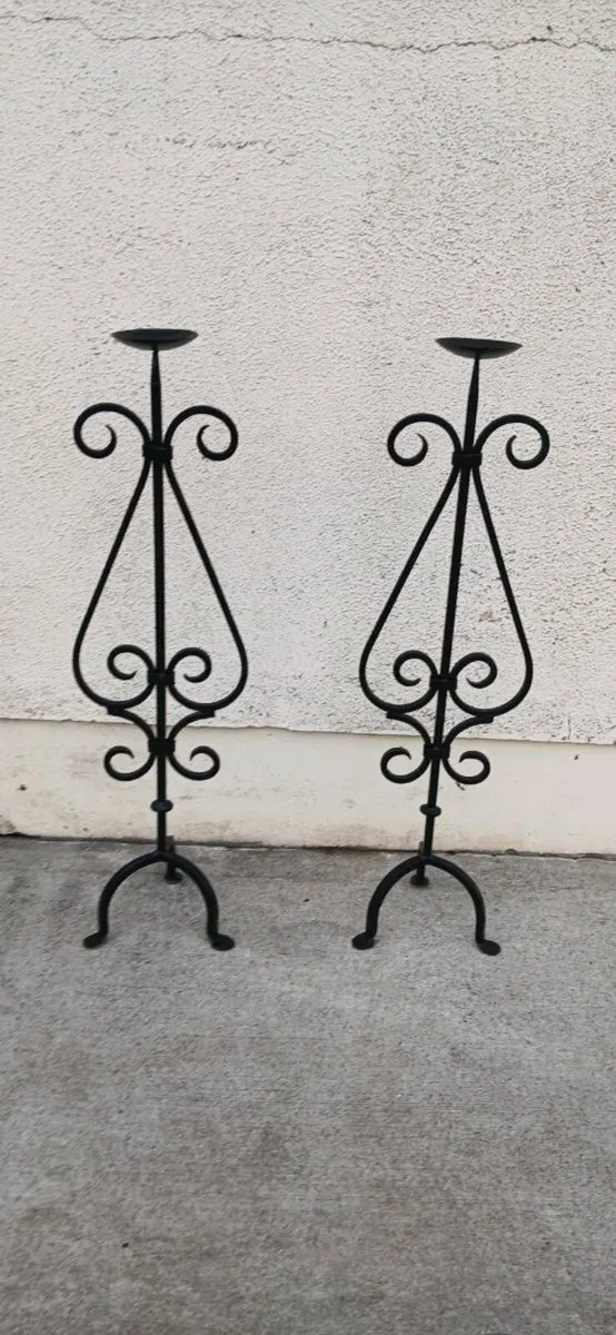 2 wrought iron candle stands
