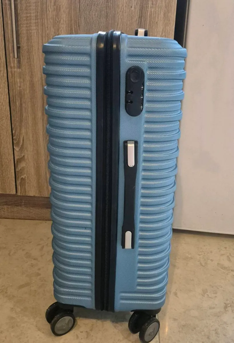 BLUE, HARDSIDE ROLLING SUITCASE FEATURING A DISTIN - Image 2